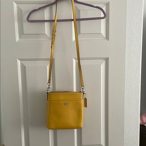 Yellow Coach pebbled leather Crossbody Bag
